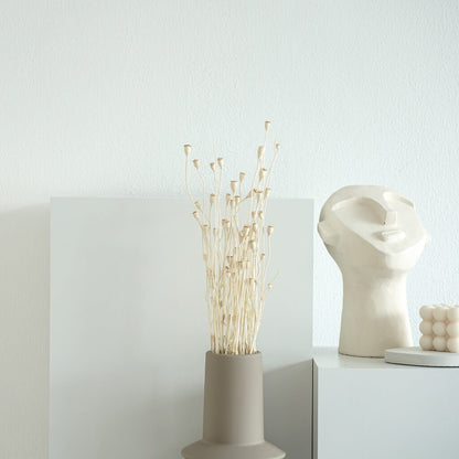 Perfect decoration: dried flower bouquet with olive branches in beige