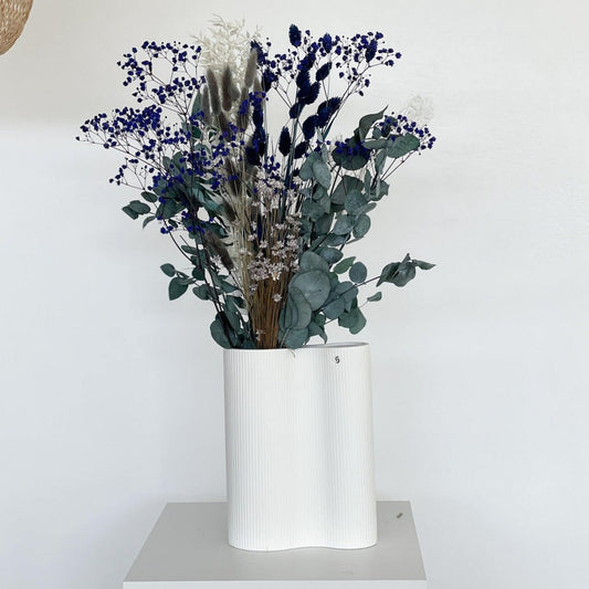 Elegant combination: Loose dry bouquet with baby's breath and eucalyptus